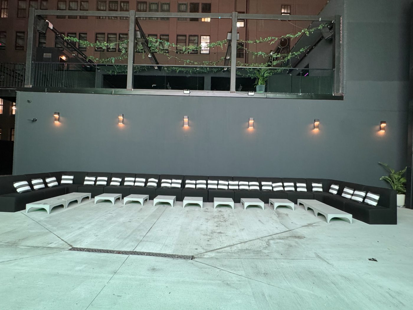 Bench seating facing the Arena screen