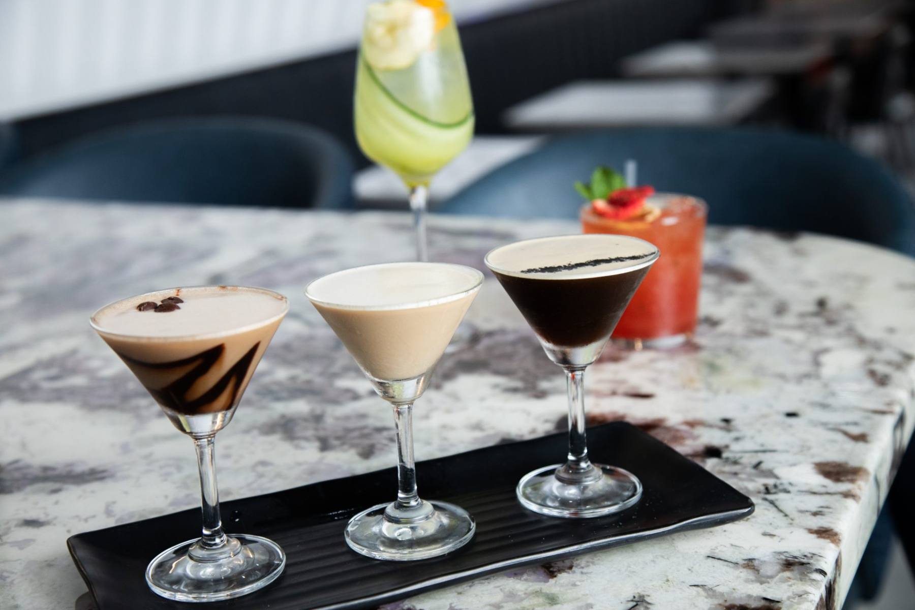 A cocktail flight at Partake NYC
