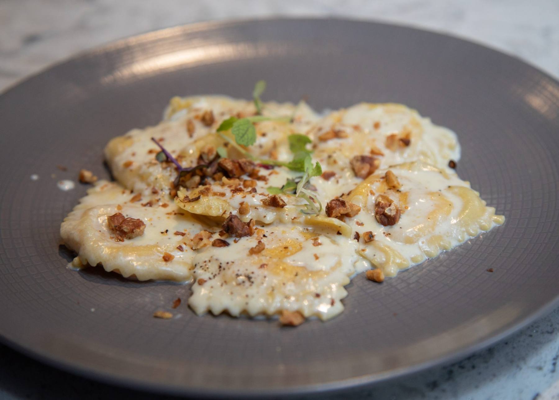 Butternut squash ravioli at Partake NYC