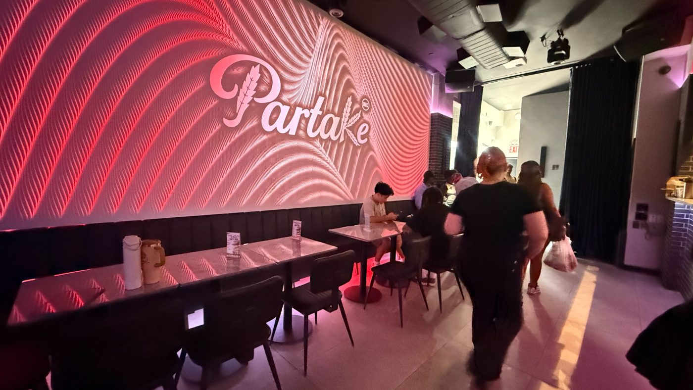 Guests in the dining room at Partake NYC