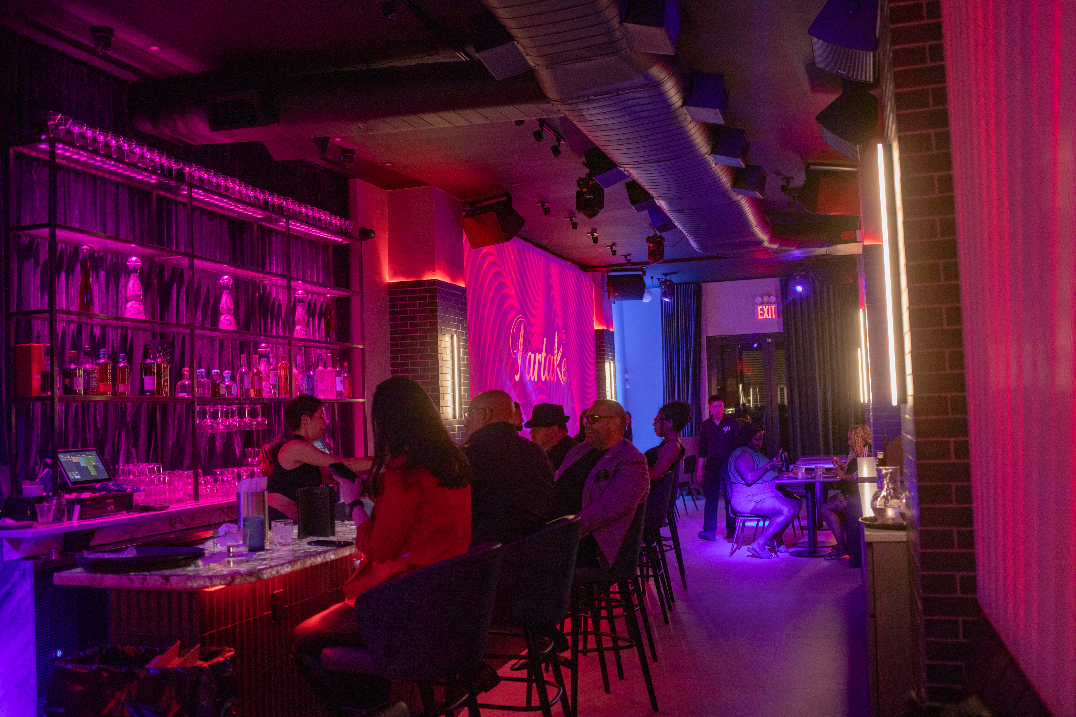 The bar at Partake NYC at night