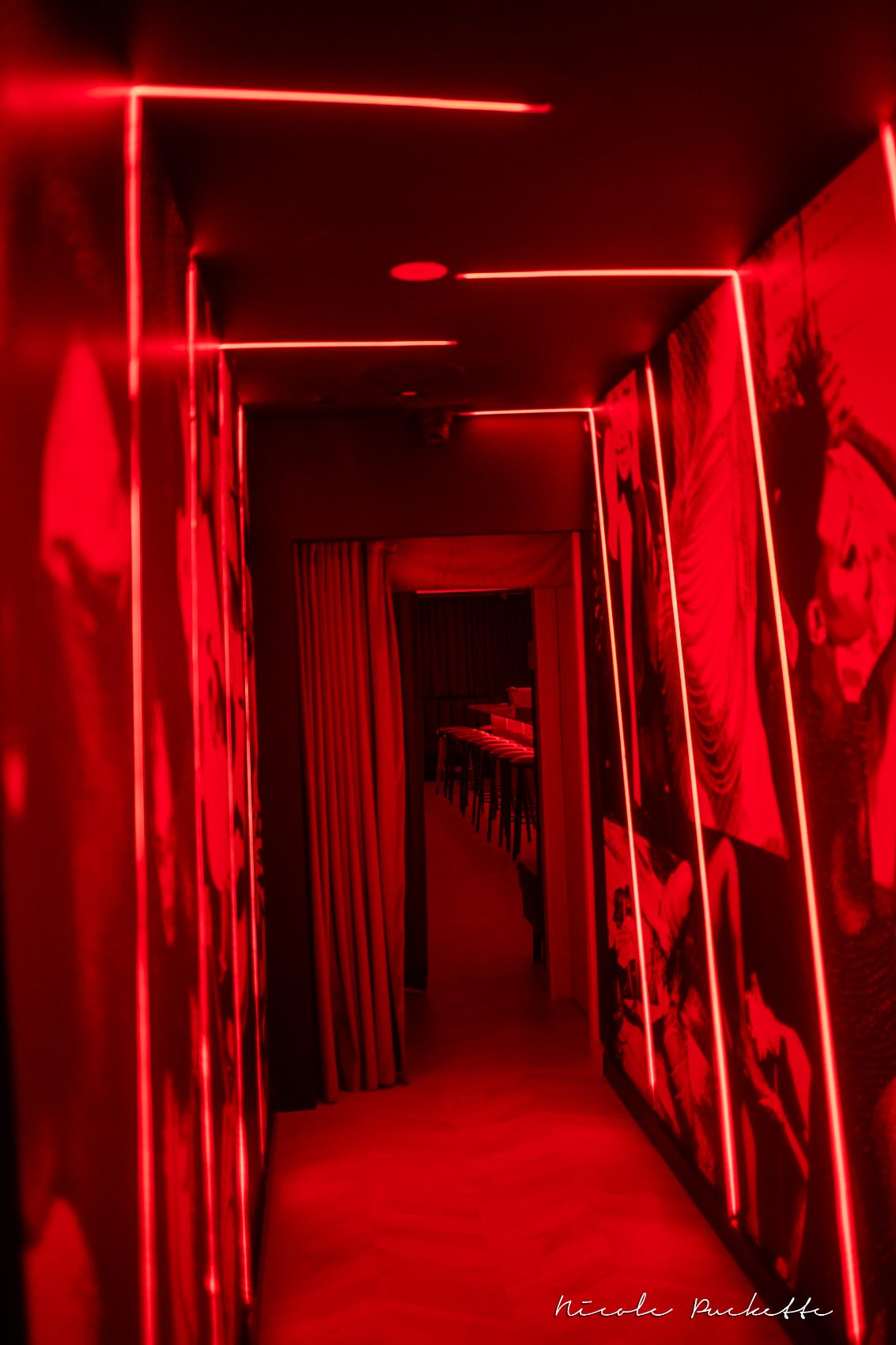 The red-lit passage to the Red Room